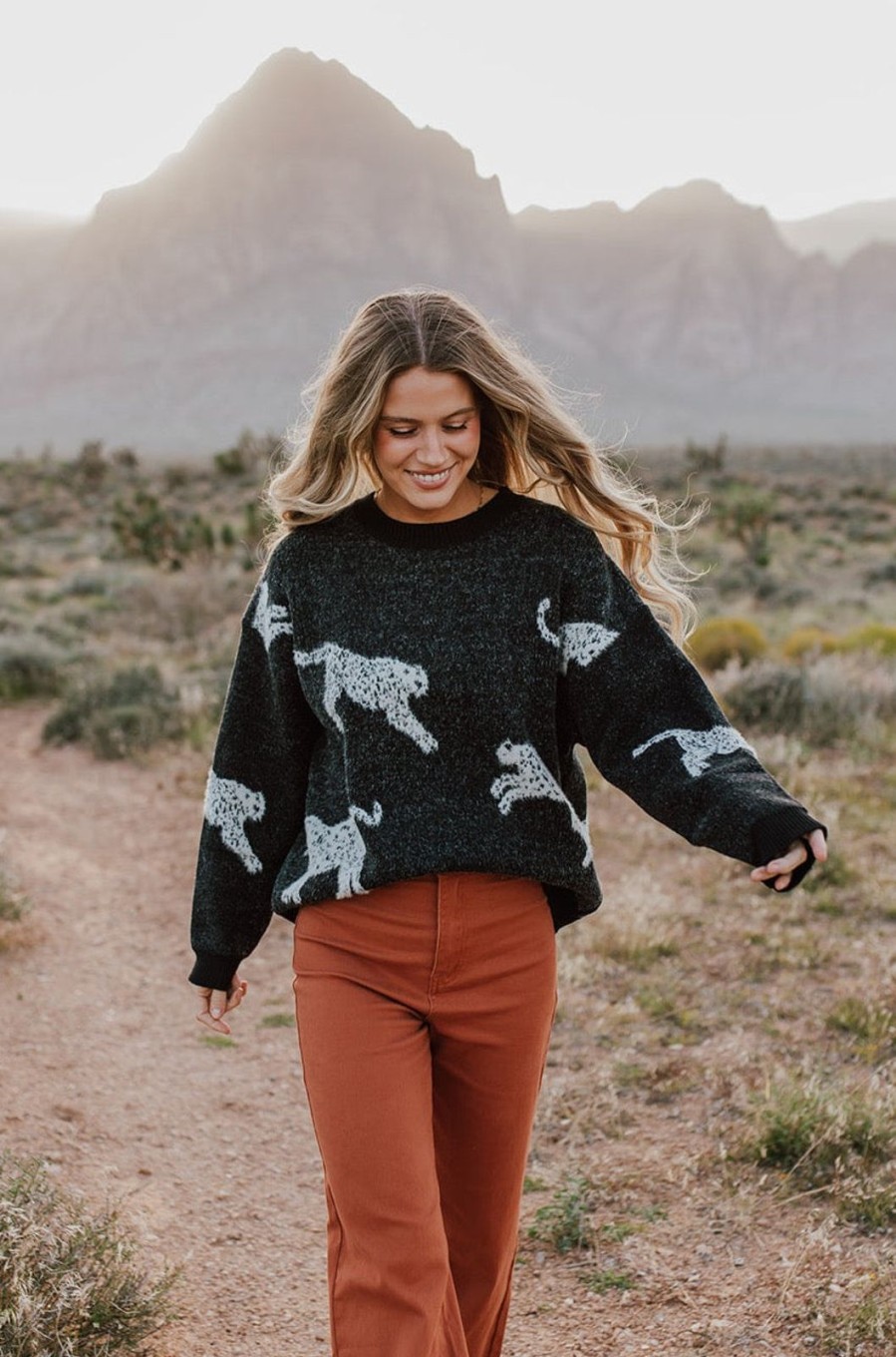 Women Pink Desert Tops | The Snow Leopard Sweater In Black